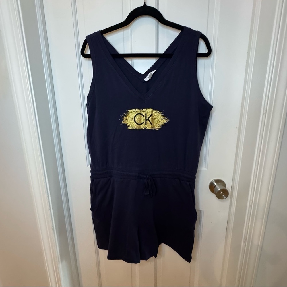 Calvin Klein Dark Blue Romper with Gold Accent